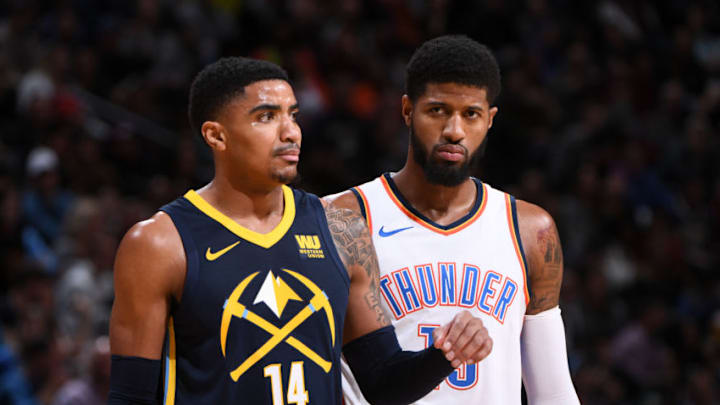DENVER, CO - FEBRUARY 1: Paul George #13 of the OKC Thunder and Gary Harris #14 of the Denver Nuggets look on February 1, 2018 at the Pepsi Center in Denver, Colorado. Copyright 2018 NBAE (Photo by Garrett Ellwood/NBAE via Getty Images)