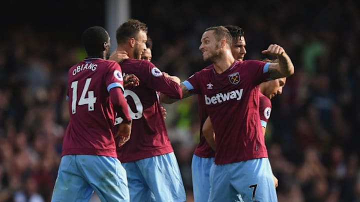 LIVERPOOL, ENGLAND - SEPTEMBER 16: Andriy Yarmolenko of West Ham United (2nd l) celebrates with Marko Arnautovic (r) after scoring the second West Ham goal during the Premier League match between Everton FC and West Ham United at Goodison Park on September 16, 2018 in Liverpool, United Kingdom. (Photo by Stu Forster/Getty Images)