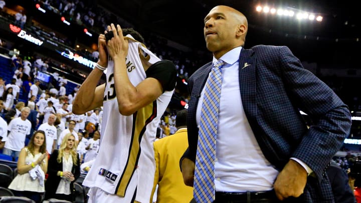 Apr 25, 2015; New Orleans, LA, USA; New Orleans Pelicans forward Anthony Davis (23) and head coach Monty Williams walk off the court after they were eliminated from the playoffs by the Golden State Warriors following game four of the first round of the NBA Playoffs at the Smoothie King Center. The Warriors defeated the Pelicans 109-98. Mandatory Credit: Derick E. Hingle-USA TODAY Sports