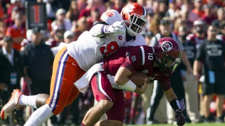 Nov 28, 2015; Columbia, SC, USA; Clemson Tigers defensive end Shaq Lawson (90) sacks South Carolina Gamecocks quarterback Perry Orth (10) during the first half at Williams-Brice Stadium. Mandatory Credit: Joshua S. Kelly-USA TODAY Sports