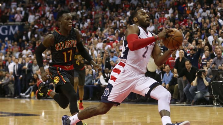 Apr 19, 2017; Washington, DC, USA; Washington Wizards guard John Wall (2) drives to the basket as Atlanta Hawks guard Dennis Schroder (17) chases in the fourth quarter in game two of the first round of the 2017 NBA Playoffs at Verizon Center. The Wizards won 109-101 and lead the series 2-0. Mandatory Credit: Geoff Burke-USA TODAY Sports
