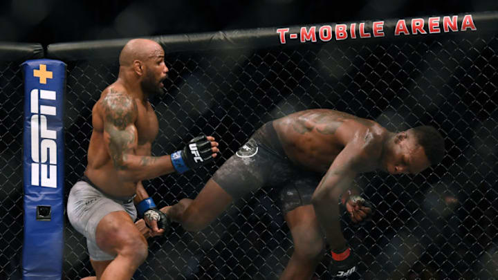 LAS VEGAS, NEVADA - MARCH 07: Israel Adesanya moves from Yoel Romero, in a Adesanya decision win to retain the middleweight title at T-Mobile Arena on March 07, 2020 in Las Vegas, Nevada. (Photo by Harry How/Getty Images)