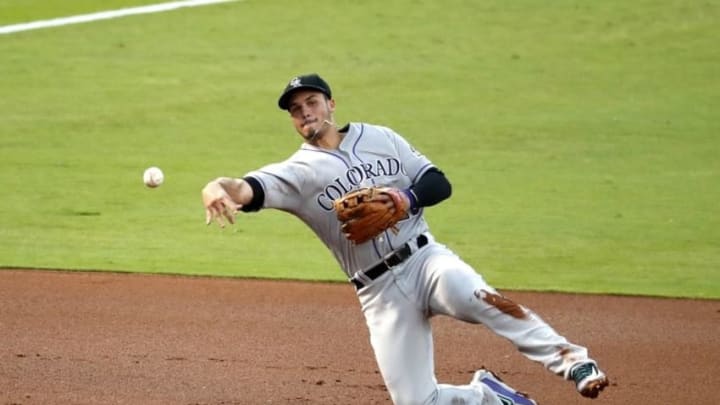 Jul 15, 2016; Atlanta, GA, USA; Colorado Rockies third baseman Nolan Arenado (28) throws to first for an out of Atlanta Braves right fielder Nick Markakis (not pictured) in the first inning at Turner Field. Mandatory Credit: Jason Getz-USA TODAY Sports