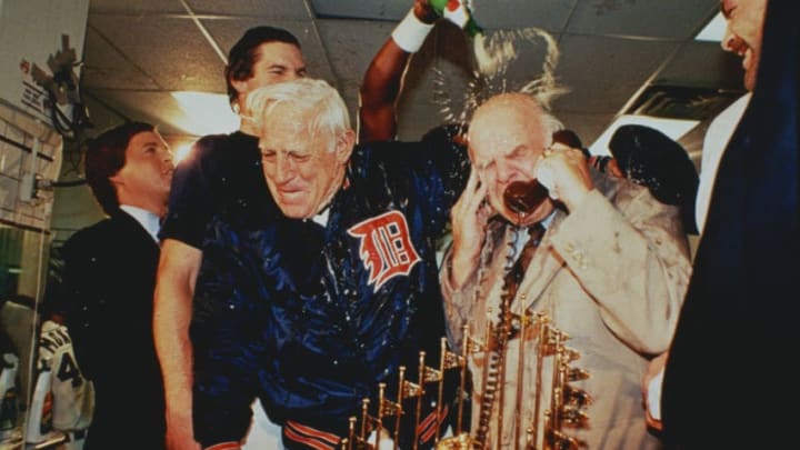 (Original Caption) USA: Sparky Anderson, Detroit Tigers, manager and Jim Campbell, enjoy the thrill of victory under a shower of Champagne in the lockerroom of the Detroit Tigers after their win over the San Diego Padres in the World Series.