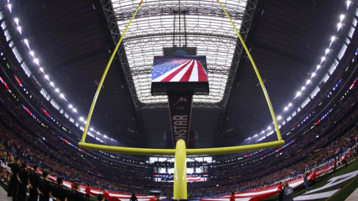 ARLINGTON, TEXAS - DECEMBER 31: A general view of AT&T Stadium during the national anthem prior to the Goodyear Cotton Bowl Classic for the College Football Playoff semifinal game on December 31, 2021 in Arlington, Texas. (Photo by Ron Jenkins/Getty Images)