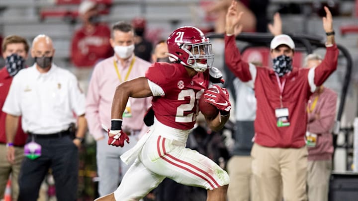 Nov 21, 2020; Tuscaloosa, Alabama, USA; Alabama Crimson Tide running back Jase McClellan (21) scores a touchdown against the Kentucky Wildcats on a fourth down play at Bryant-Denny Stadium. Mandatory Credit: Mickey Welsh/The Montgomery Advertiser via USA TODAY Sports