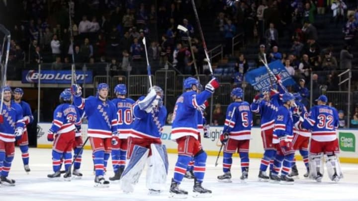 Feb 4, 2016; New York, NY, USA; The New York Rangers celebrate after the third period against the Minnesota Wild at Madison Square Garden. The Rangers defeated the Wild 4-2. Mandatory Credit: Brad Penner-USA TODAY Sports