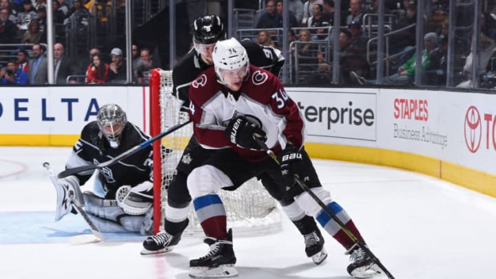 LOS ANGELES, CA - APRIL 2: Carl Soderberg #34 of the Colorado Avalanche handles the puck against Adrian Kempe #9 of the Los Angeles Kings at STAPLES Center on April 2, 2018 in Los Angeles, California. (Photo by Juan Ocampo/NHLI via Getty Images)