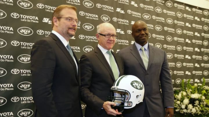 FLORHAM PARK, NJ - JANUARY 21: New York Jets Owner Woody Johnson (C) poses with new General Manager Mike Maccagnan (L) and new Head Coach Todd Bowles after they were introduced to the media during a press conference on January 21, 2015 in Florham Park, New Jersey. (Photo by Rich Schultz /Getty Images)