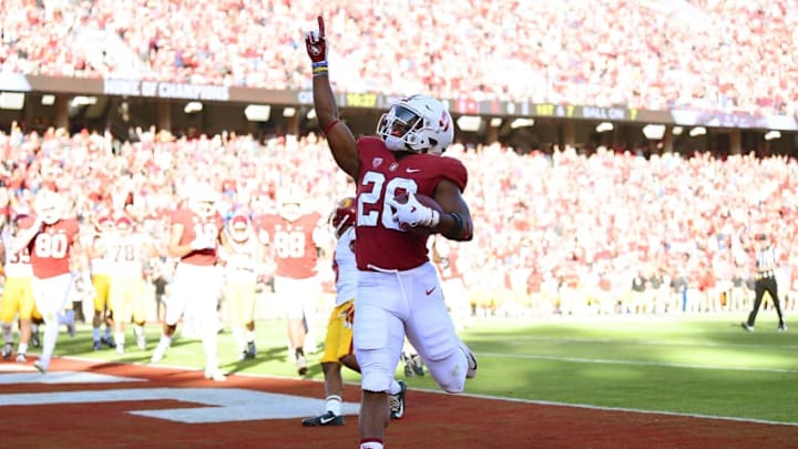 Draft: PALO ALTO, CA - SEPTEMBER 08: Bryce Love #20 of the Stanford Cardinal celebrates after scoring on a seven yard touchdown run against the USC Trojans in the first quarter of an NCAA football game at Stanford Stadium on September 8, 2018 in Palo Alto, California. (Photo by Thearon W. Henderson/Getty Images)