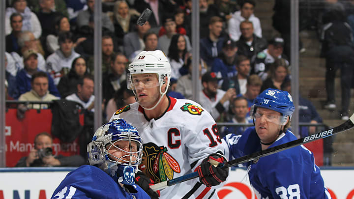 TORONTO, ON – JANUARY 18: Frederik Andersen #31 of the Toronto Maple Leafs keeps an eye on a puck with Jonathan Toews #19 of the Chicago Blackhawks on his doorstep during an NHL game at Scotiabank Arena on January 18, 2020 in Toronto, Ontario, Canada. The Blackhawks defeated the Maple Leafs 6-2. (Photo by Claus Andersen/Getty Images)