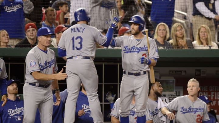 WASHINGTON, DC - MAY 19: Max Muncy #13 of the Los Angeles Dodgers celebrates with Chris Taylor #3 after hitting a home run in the fifth inning against the Washington Nationals at Nationals Park during game two of a doubleheader on May 19, 2018 in Washington, DC. (Photo by Greg Fiume/Getty Images)