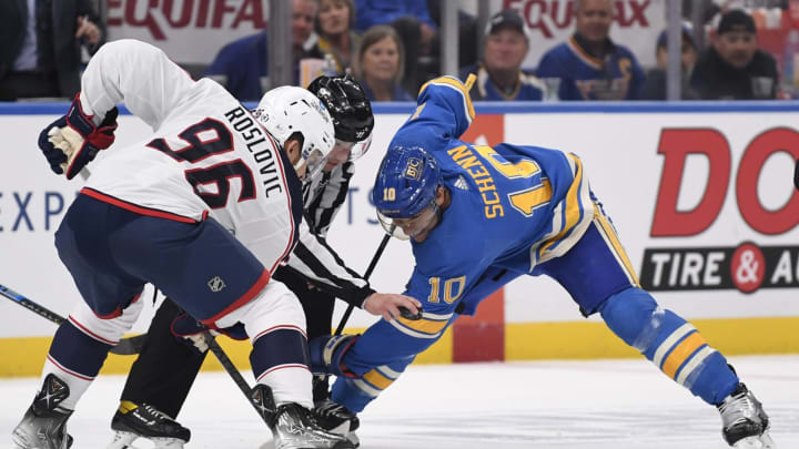 Oct 15, 2022; St. Louis, Missouri, USA; Columbus Blue Jackets center Jack Roslovic (96) take the face-off again St. Louis Blues center Brayden Schenn (10) during the second period at Enterprise Center. Mandatory Credit: Jeff Le-USA TODAY Sports
