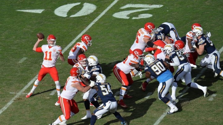 Jan 1, 2017; San Diego, CA, USA; Kansas City Chiefs quarterback Alex Smith (11) passes against the San Diego Chargers during the second quarter at Qualcomm Stadium. Mandatory Credit: Jake Roth-USA TODAY Sports