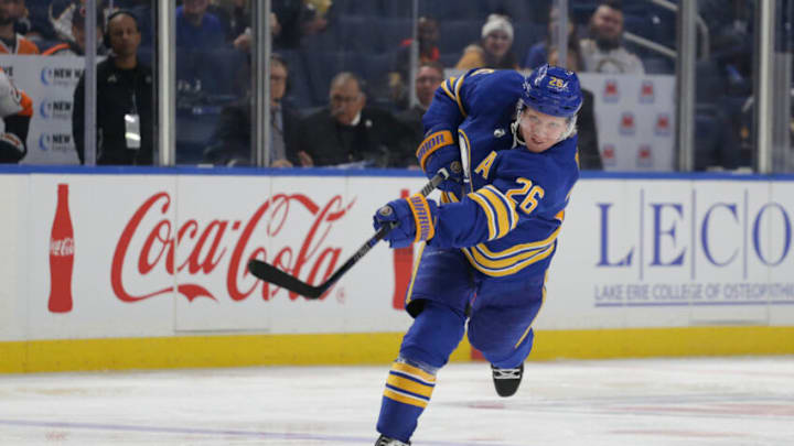 BUFFALO, NEW YORK - SEPTEMBER 27: Rasmus Dahlin #26 of the Buffalo Sabres shoots during the third period against the Philadelphia Flyers at KeyBank Center on September 27, 2022 in Buffalo, New York. (Photo by Joshua Bessex/Getty Images)