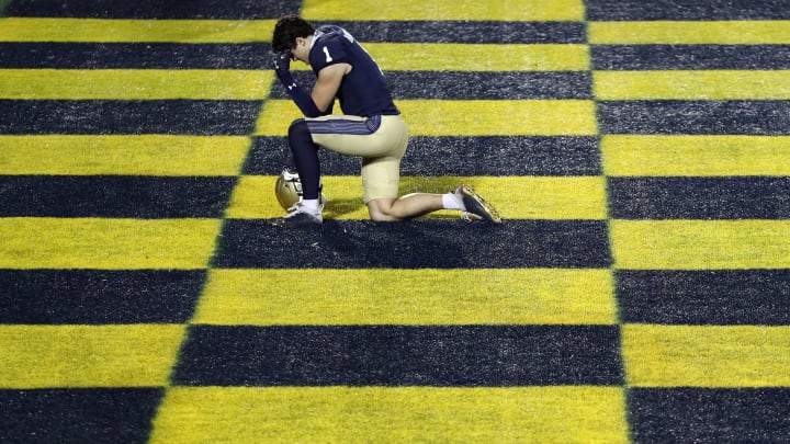 ANNAPOLIS, MARYLAND – NOVEMBER 28: Quarterback Tai Lavatai #1 of the Navy Midshipmen has a moment to himself before playing against the Memphis Tigers at Navy-Marine Corps Memorial Stadium on November 28, 2020, in Annapolis, Maryland. (Photo by Patrick Smith/Getty Images)
