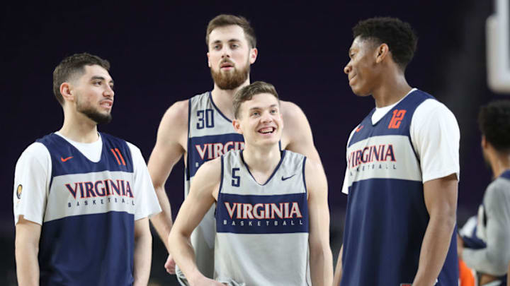 MINNEAPOLIS, MINNESOTA - APRIL 05: Ty Jerome #11, Jay Huff #30, Kyle Guy #5 and De'Andre Hunter #12 of the Virginia Cavaliers look on during practice prior to the 2019 NCAA men's Final Four at U.S. Bank Stadium on April 5, 2019 in Minneapolis, Minnesota. (Photo by Streeter Lecka/Getty Images)