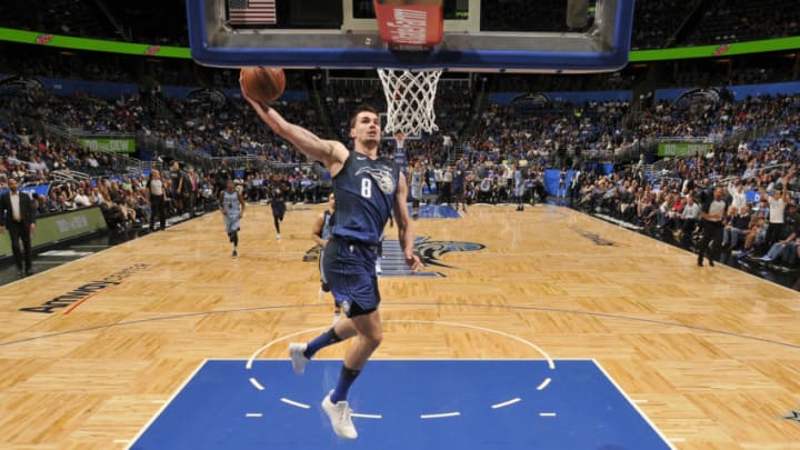 ORLANDO, FL - MARCH 23: Mario Hezonja #8 of the Orlando Magic drives to the basket during the game against the Memphis Grizzlies on March 23, 2018 at Amway Center in Orlando, Florida. NOTE TO USER: User expressly acknowledges and agrees that, by downloading and/or using this photograph, user is consenting to the terms and conditions of the Getty Images License Agreement. Mandatory Copyright Notice: Copyright 2018 NBAE (Photo by Fernando Medina/NBAE via Getty Images)