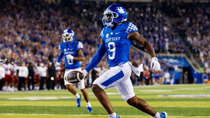 Sep 24, 2022; Lexington, Kentucky, USA; Kentucky Wildcats wide receiver Tayvion Robinson (9) scores a touchdown during the fourth quarter against the Northern Illinois Huskies at Kroger Field. Mandatory Credit: Jordan Prather-USA TODAY Sports