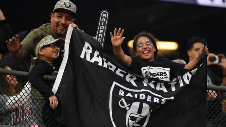 OAKLAND, CA - NOVEMBER 11: Fans cheer in the stands during their NFL game between the Oakland Raiders and the Los Angeles Chargers at Oakland-Alameda County Coliseum on November 11, 2018 in Oakland, California. (Photo by Thearon W. Henderson/Getty Images)