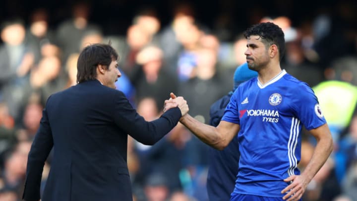 LONDON, ENGLAND - FEBRUARY 04: Antonio Conte, manager of Chelsea shakes hands with Diego Costa of Chelsea after the Premier League match between Chelsea and Arsenal at Stamford Bridge on February 4, 2017 in London, England. (Photo by Clive Rose/Getty Images)