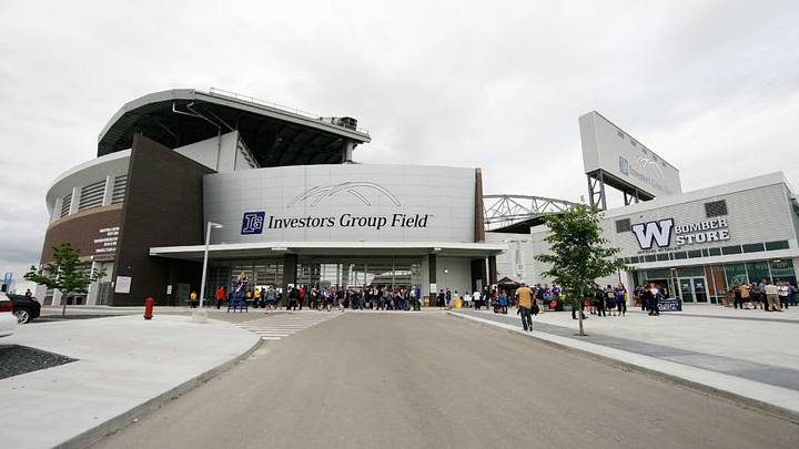WINNIPEG, MB - JUNE 26: Spectators make their way to Investors Group Field before a CFL game between the Toronto Argonauts and Winnipeg Blue Bombers on June 26, 2014 in Winnipeg, Manitoba, Canada. (Photo by Marianne Helm/Getty Images)