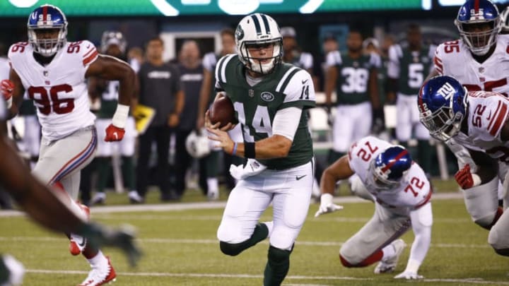 EAST RUTHERFORD, NJ - AUGUST 24: Sam Darnold #14 of the New York Jets runs the ball during their preseason game against the New York Giants at MetLife Stadium on August 24, 2018 in East Rutherford, New Jersey. (Photo by Jeff Zelevansky/Getty Images)