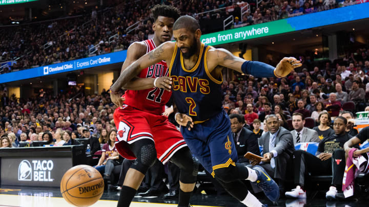 CLEVELAND, OH – FEBRUARY 25: Kyrie Irving #2 of the Cleveland Cavaliers tries to drive past Jimmy Butler #21 of the Chicago Bulls during the first half at Quicken Loans Arena on February 25, 2017 in Cleveland, Ohio. NOTE TO USER: User expressly acknowledges and agrees that, by downloading and/or using this photograph, user is consenting to the terms and conditions of the Getty Images License Agreement. (Photo by Jason Miller/Getty Images)