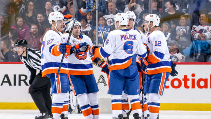 WINNIPEG, MB - MARCH 28: Anders Lee #27, Jordan Eberle #7, Ryan Pulock #6, Brock Nelson #29 and Josh Bailey #12 of the New York Islanders celebrate a second period goal against the Winnipeg Jets at the Bell MTS Place on March 28, 2019 in Winnipeg, Manitoba, Canada. (Photo by Jonathan Kozub/NHLI via Getty Images)