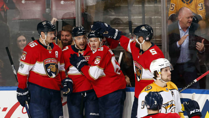 SUNRISE, FL – APRIL 3: Colton Sceviour #7 of the Florida Panthers celebrates his goal with teammates to win the game against the Nashville Predators at the BB&T Center on April 3, 2018 in Sunrise, Florida. (Photo by Eliot J. Schechter/NHLI via Getty Images) *** Local Caption *** Colton Sceviour