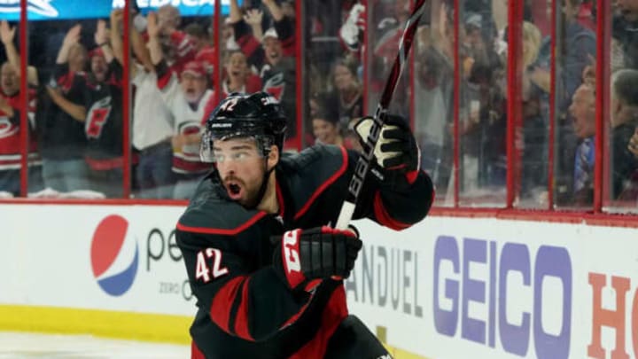 RALEIGH, NC – MAY 03: Greg McKegg #42 of the Carolina Hurricanes celebrates after scoring a goal in Game Four of the Eastern Conference Second Round against the New York Islanders during the 2019 NHL Stanley Cup Playoffs on May 3, 2019 at PNC Arena in Raleigh, North Carolina. (Photo by Gregg Forwerck/NHLI via Getty Images)