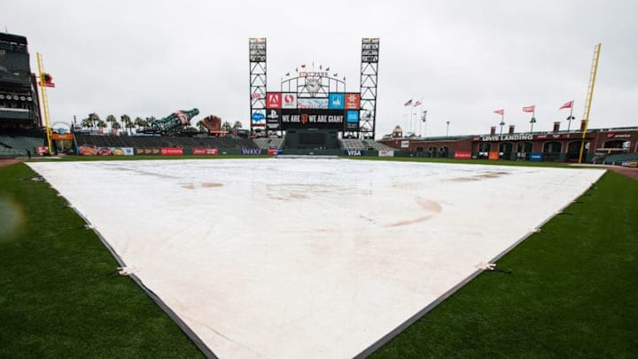 SAN FRANCISCO, CA - APRIL 09: General view of AT&T Park with a tarp covering the infield during a rain shower before the game between the San Francisco Giants and the Los Angeles Dodgers on April 9, 2016 in San Francisco, California. (Photo by Jason O. Watson/Getty Images)