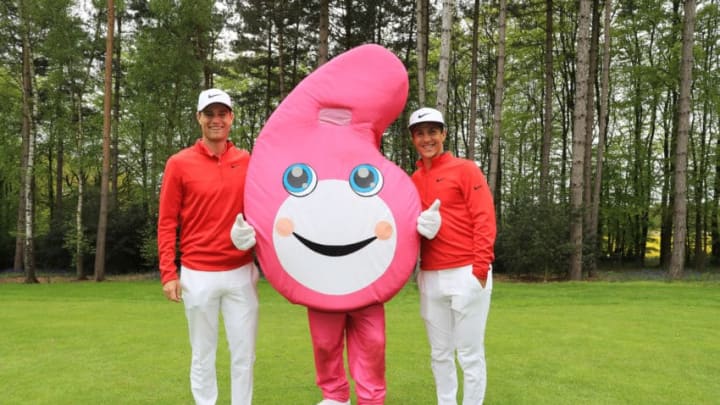 ST ALBANS, ENGLAND - MAY 04: 2017 champions Lucas Bjerregaard of Denmark and Thorbjorn Olesen of Denmark pose with the GolfSixes mascot during the ProAm tournament ahead of the GolfSixes at The Centurion Club on May 4, 2018 in St Albans, England. (Photo by Andrew Redington/Getty Images)