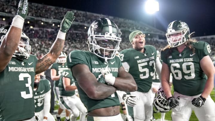 EAST LANSING, MICHIGAN – OCTOBER 15: Jayden Reed #1 of the Michigan State Spartans reacts after making the game-winning reception against the Wisconsin Badgers in double overtime at Spartan Stadium on October 15, 2022 in East Lansing, Michigan. (Photo by Nic Antaya/Getty Images)