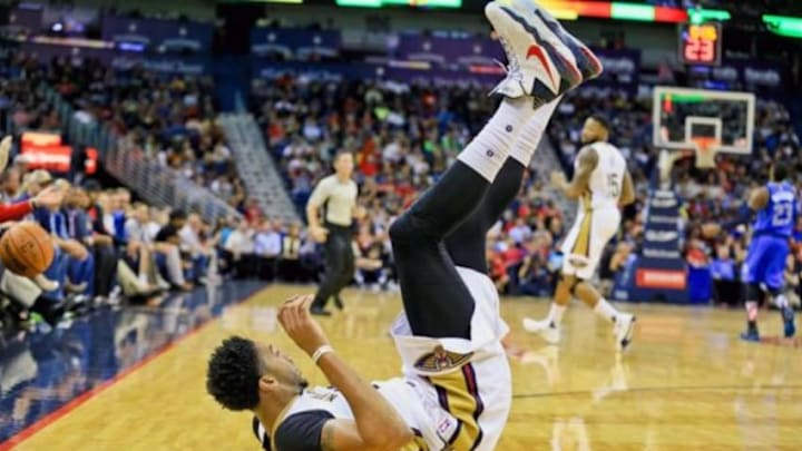 Nov 10, 2015; New Orleans, LA, USA; New Orleans Pelicans forward Anthony Davis (23) is knocked to the floor during the second quarter of a game against the Dallas Mavericks at the Smoothie King Center. Mandatory Credit: Derick E. Hingle-USA TODAY Sports