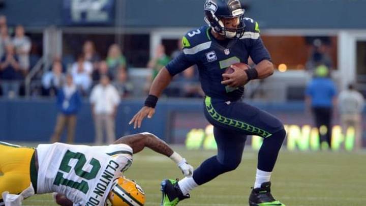 Sep 4, 2014; Seattle, WA, USA; Seattle Seahawks quarterback Russell Wilson (3) is pursued by Green Bay Packers safety Ha Ha Clinton Dix (21) at CenturyLink Field. Mandatory Credit: Kirby Lee-USA TODAY Sports Sep 4, 2014; Seattle, WA, USA; Seattle Seahawks quarterback Russell Wilson (3) is pursued by Green Bay Packers safety Ha Ha Clinton Dix (21) at CenturyLink Field. Mandatory Credit: Kirby Lee-USA TODAY Sports