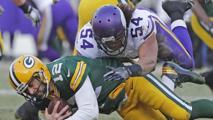 Dec 24, 2016; Green Bay, WI, USA; Green Bay Packers quarterback Aaron Rodgers (12) is sacked by Minnesota Vikings middle linebacker Eric Kendricks (54) in the second quarter at Lambeau Field. Mandatory Credit: Jim Matthews/USA TODAY NETWORK-Wisconsin via USA TODAY Sports