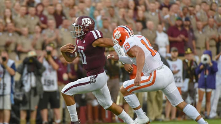 COLLEGE STATION, TX - SEPTEMBER 08: Texas A&M Aggies quarterback Kellen Mond (11) finds running room to his right as Clemson Tigers safety Tanner Muse (19) closes in during the college football game between the Clemson Tigers and the Texas A&M Aggies on September 8, 2018 at Kyle Field in College Station, Texas. (Photo by Ken Murray/Icon Sportswire via Getty Images)