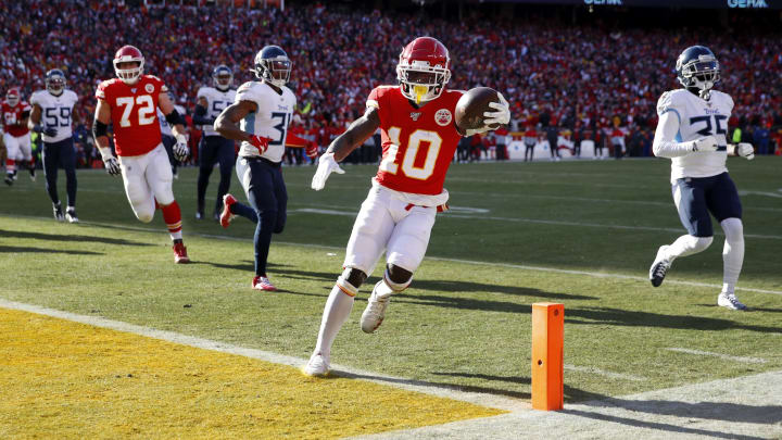 KANSAS CITY, MO – JANUARY 19: Tyreek Hill #10 of the Kansas City Chiefs runs the ball into the end zone for a touchdown during the AFC Championship game against the Tennessee Titans at Arrowhead Stadium on January 19, 2020 in Kansas City, Missouri. The Chiefs defeated the Titans 35-24. (Photo by Joe Robbins/Getty Images)