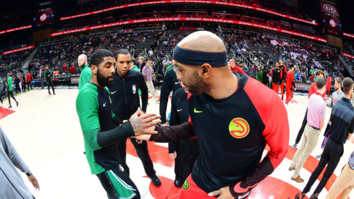 ATLANTA, GA - JANUARY 19: Kyrie Irving #11 of the Boston Celtics and Vince Carter #15 of the Atlanta Hawks exchange handshakes at the beginning of the game on January 19, 2019 at State Farm Arena in Atlanta, Georgia. NOTE TO USER: User expressly acknowledges and agrees that, by downloading and/or using this Photograph, user is consenting to the terms and conditions of the Getty Images License Agreement. Mandatory Copyright Notice: Copyright 2019 NBAE (Photo by Scott Cunningham/NBAE via Getty Images)