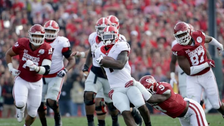 PASADENA, CA - JANUARY 01: Running back Sony Michel #1 of the Georgia Bulldogs runs the ball against the Oklahoma Sooners in the 2018 College Football Playoff Semifinal at the Rose Bowl Game presented by Northwestern Mutual at the Rose Bowl on January 1, 2018 in Pasadena, California. (Photo by Jeff Gross/Getty Images)
