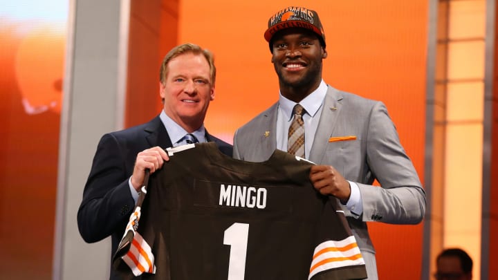 NEW YORK, NY – APRIL 25: Barkevious Mingo of the LSU Tigers stands on stage with NFL Commissioner Roger Goodell as they hold up a jersey on stage after Mingo was picked #6 overall by the Cleveland Browns in the first round of the 2013 NFL Draft at Radio City Music Hall on April 25, 2013 in New York City. (Photo by Al Bello/Getty Images)