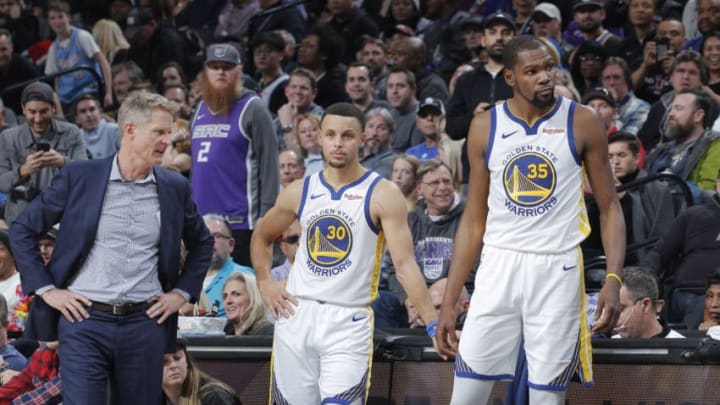 SACRAMENTO, CA - DECEMBER 14: Head Coach Steve Kerr of the Golden State Warriors coaches Stephen Curry #30 and Kevin Durant #35 against the Sacramento Kings on December 14, 2018 at Golden 1 Center in Sacramento, California. NOTE TO USER: User expressly acknowledges and agrees that, by downloading and or using this photograph, User is consenting to the terms and conditions of the Getty Images Agreement. Mandatory Copyright Notice: Copyright 2018 NBAE (Photo by Rocky Widner/NBAE via Getty Images)