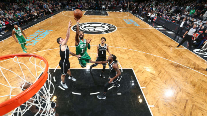 BROOKLYN, NY - JANUARY 6: Kyrie Irving #11 of the Boston Celtics shoots the ball against the Brooklyn Nets on January 6, 2018 at Barclays Center in Brooklyn, New York. NOTE TO USER: User expressly acknowledges and agrees that, by downloading and/or using this photograph, user is consenting to the terms and conditions of the Getty Images License Agreement. Mandatory Copyright Notice: Copyright 2018 NBAE (Photo by Nathaniel S. Butler/NBAE via Getty Images)