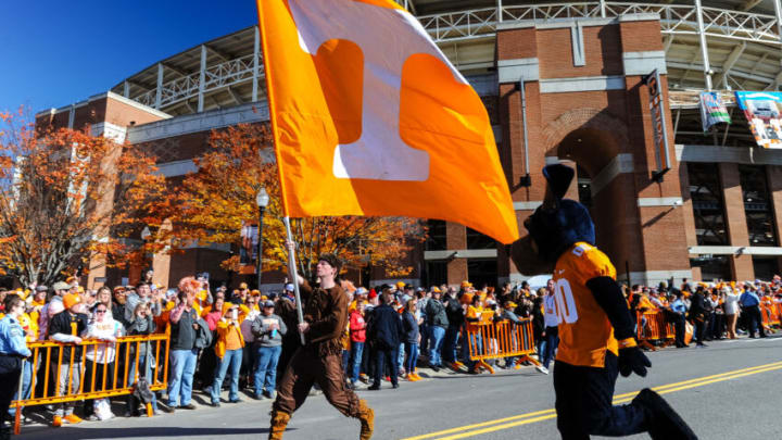 Nov 13, 2021; Knoxville, Tennessee, USA; Tennessee Volunteers mascots Davey Crockett and Smokey entertain the crowd at the Vol Walk before a game between the Tennessee Volunteers and the Georgia Bulldogs at Neyland Stadium. Mandatory Credit: Bryan Lynn-USA TODAY Sports