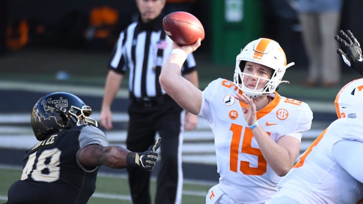 Dec 12, 2020; Nashville, Tennessee, USA; Tennessee Volunteers quarterback Harrison Bailey (15) attempts a pass during the first half against the Vanderbilt Commodores at Vanderbilt Stadium. Mandatory Credit: Christopher Hanewinckel-USA TODAY Sports