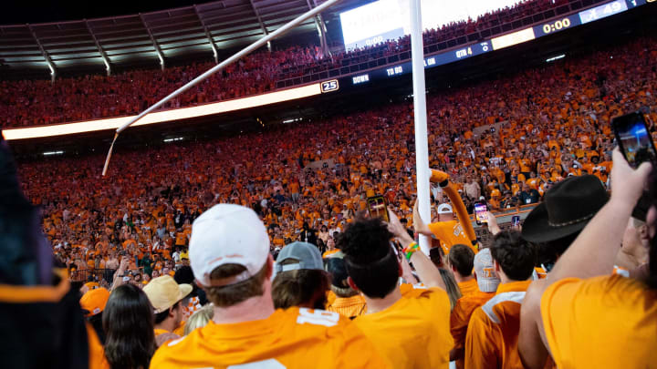 Fans tear down the goal post after Tennessee’s game against Alabama in Neyland Stadium in Knoxville, Tenn., on Saturday, Oct. 15, 2022.Kns Ut Bama Football Bp