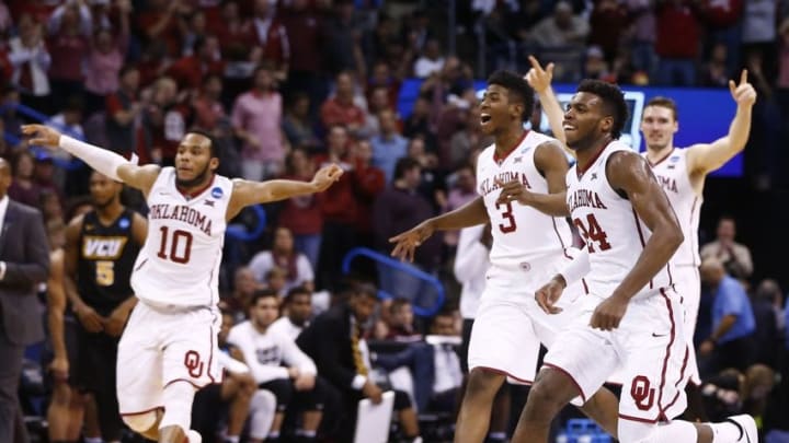 Mar 20, 2016; Oklahoma City, OK, USA; Oklahoma Sooners guard Christian James (3) and guard Buddy Hield (24) celebrate defeating the Virginia Commonwealth Rams 85-81 during the second round of the 2016 NCAA Tournament at Chesapeake Energy Arena. Mandatory Credit: Kevin Jairaj-USA TODAY Sports
