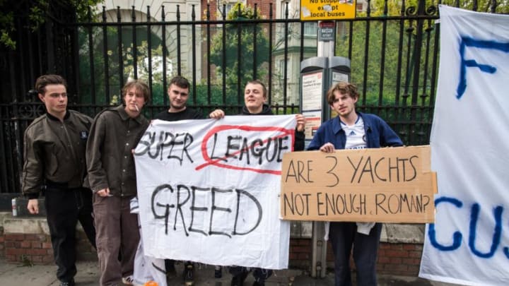 Fans protest European Super League in London (Photo by Sebastian Frej/MB Media/Getty Images)
