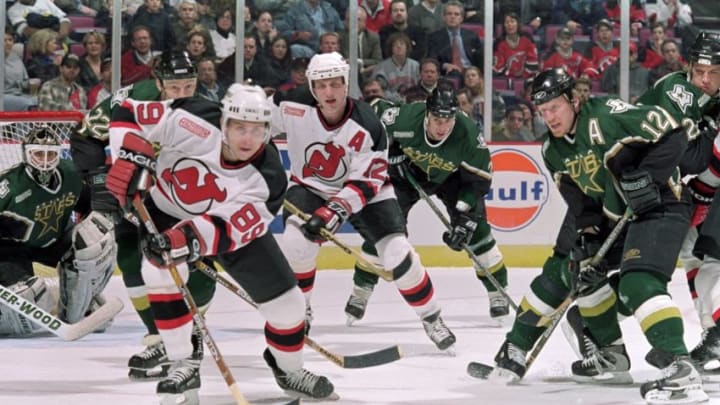 15 Mar 2000: Alexander Moginly #89 of the New Jersey Devils moves after the puck during a game against of the Dallas Stars at the Continental Airlines Arena in East Rutherford, New Jersey. The Stars defeated the Devils 3-2.